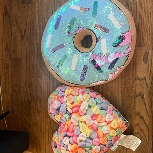 Comfy pillows!! Donut and heart pillow! The heart one smells very good!! Used